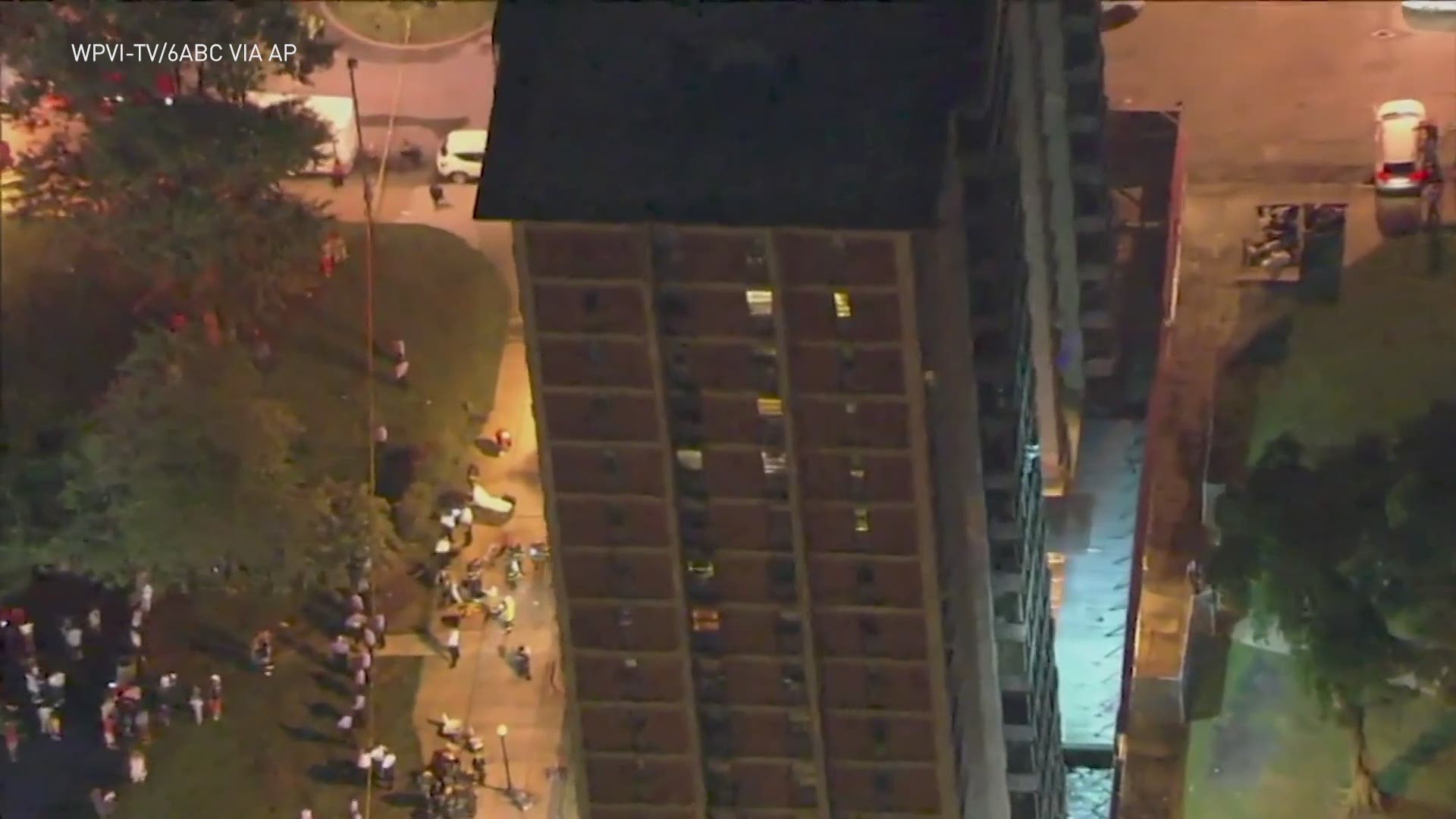 Video from the WPVI-TV helicopter in Philadelphia shows a man scaling down the side of a high rise building during a fire on Thursday night.