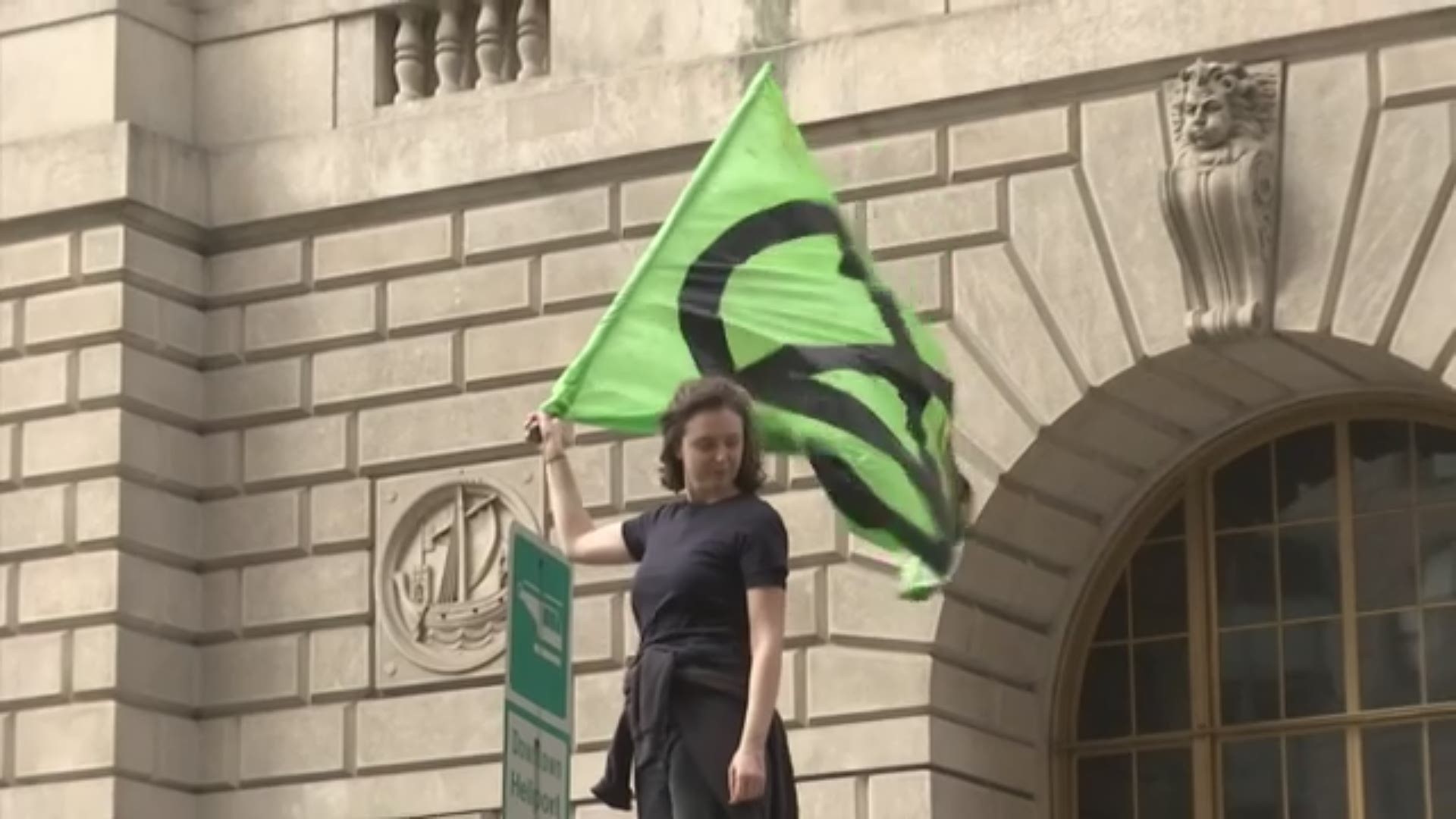 Dozens of people protested a lack of action to combat climate change in New York on Monday. (AP)