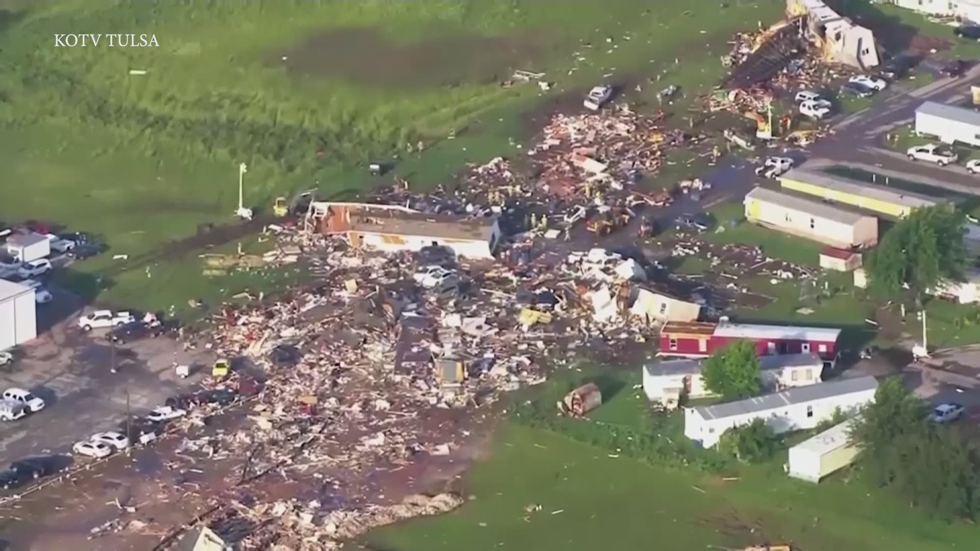 A tornado leveled a motel and tore through a mobile home park near Oklahoma City overnight, killing two people and injuring at least 29 others, authorities said Sunday.