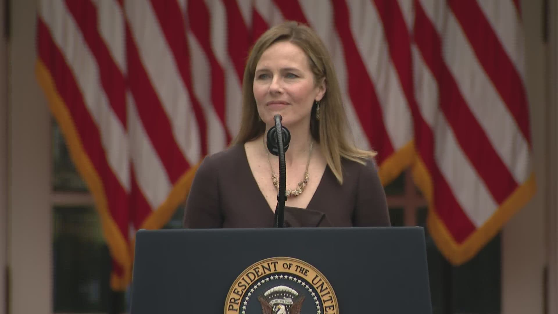 President Donald Trump says Amy Coney Barrett would be the first mother of school-age children to serve on the Supreme Court.