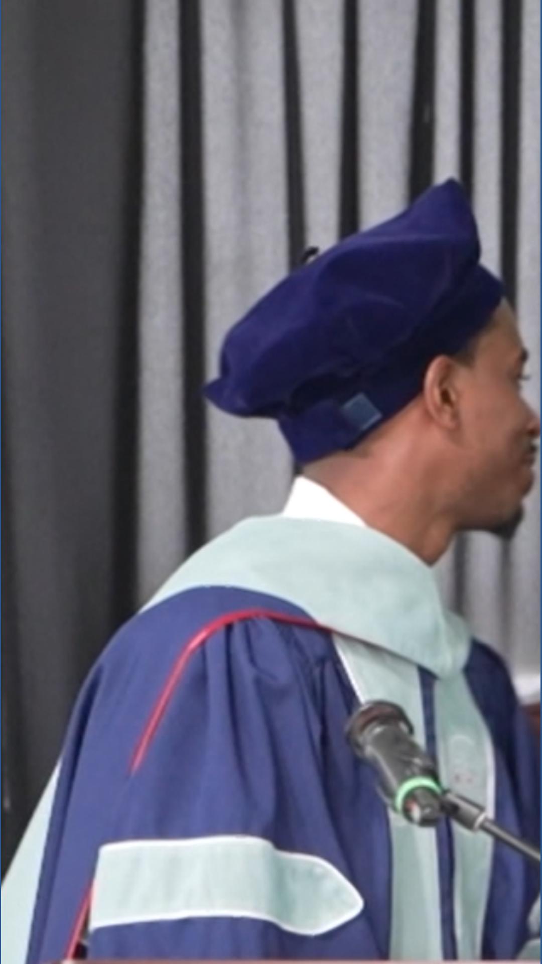 Paralyzed graduate walks across stage with robotic suit to earn MA ...