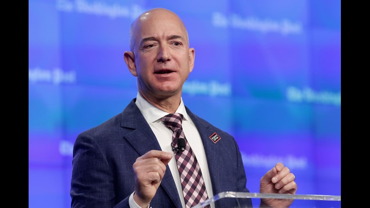 Amazon CEO Jeff Bezos gives a rare live interview on stage at the Economic Club of Washington D.C. with private equity executive David Rubenstein