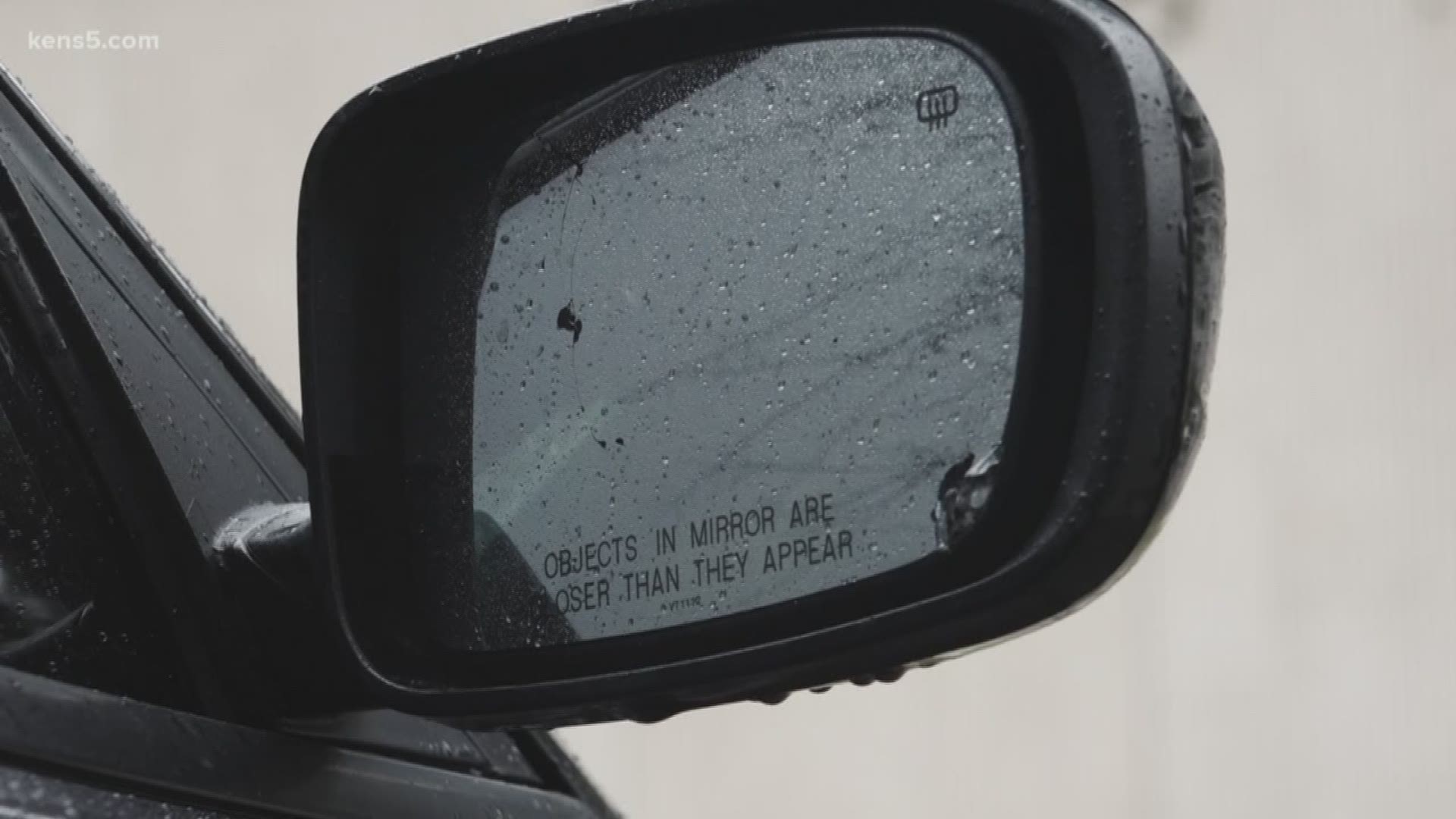 A woman is speaking out after she claims someone fired several shots at her car while traveling southbound on I-35 on Monday.