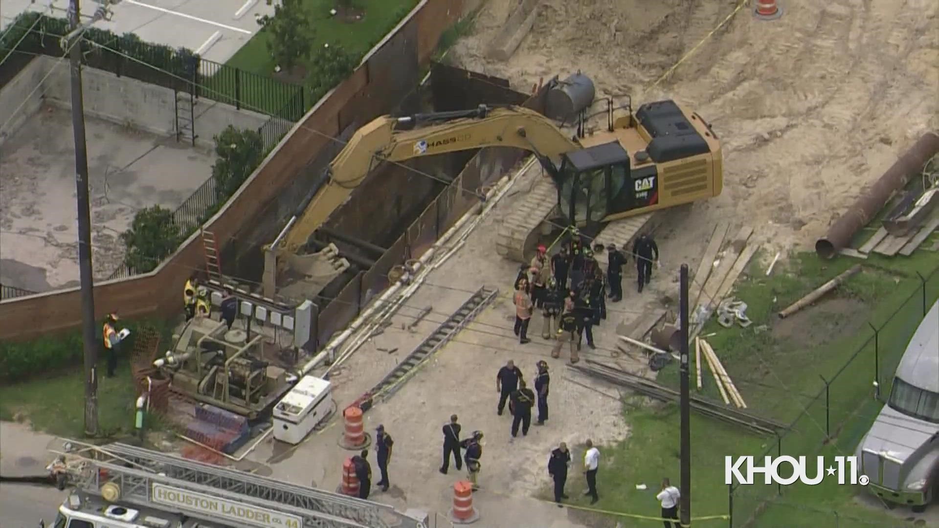 The initial call was for a trench rescue, but HFD crews later found the worker had died.