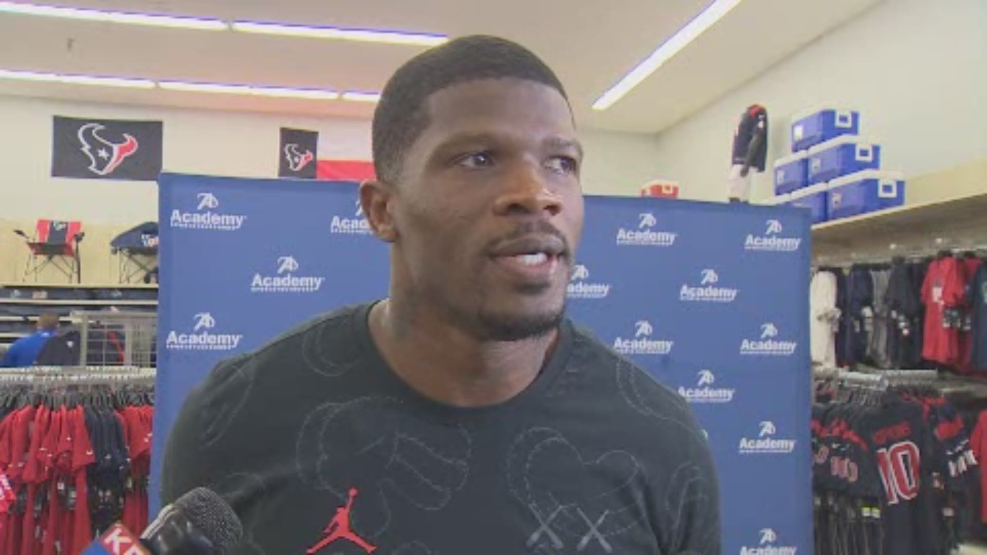 Former Texan Andre Johnson put big smiles on the faces of some lucky kids Thursday.  He helped them pick out back-to-school gear during a shopping spree at Academy Sports + Outdoors.