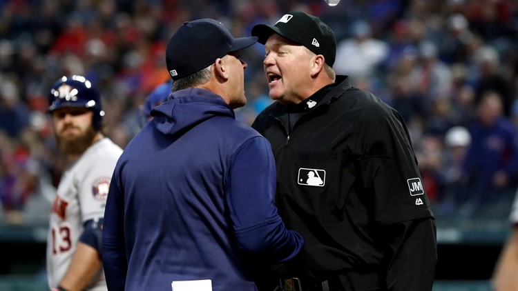Houston Astros hitting coach Alex Cintron shows replays to Jose