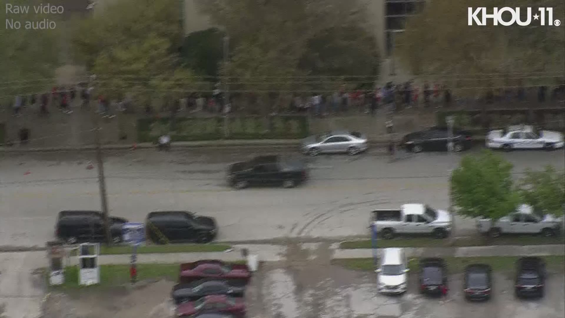 Fans lined up early to get the Travis Scott bobblehead giveaway at Toyota Center on Feb. 24, 2020.