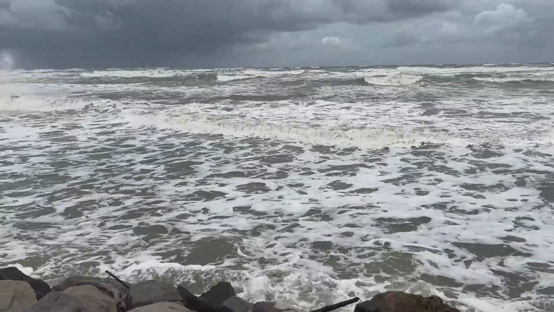 "No swimming" flags went up in Surfside Tuesday morning as waves crashed ashore.