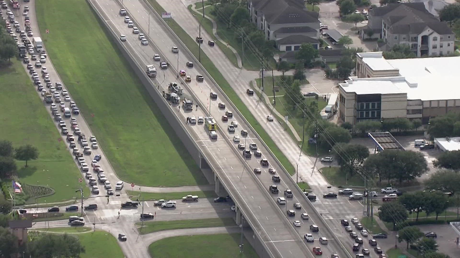 An overturned 18-wheeler caused a traffic nightmare for travelers headed eastbound on the Westpark Tollway near Grand Mission.