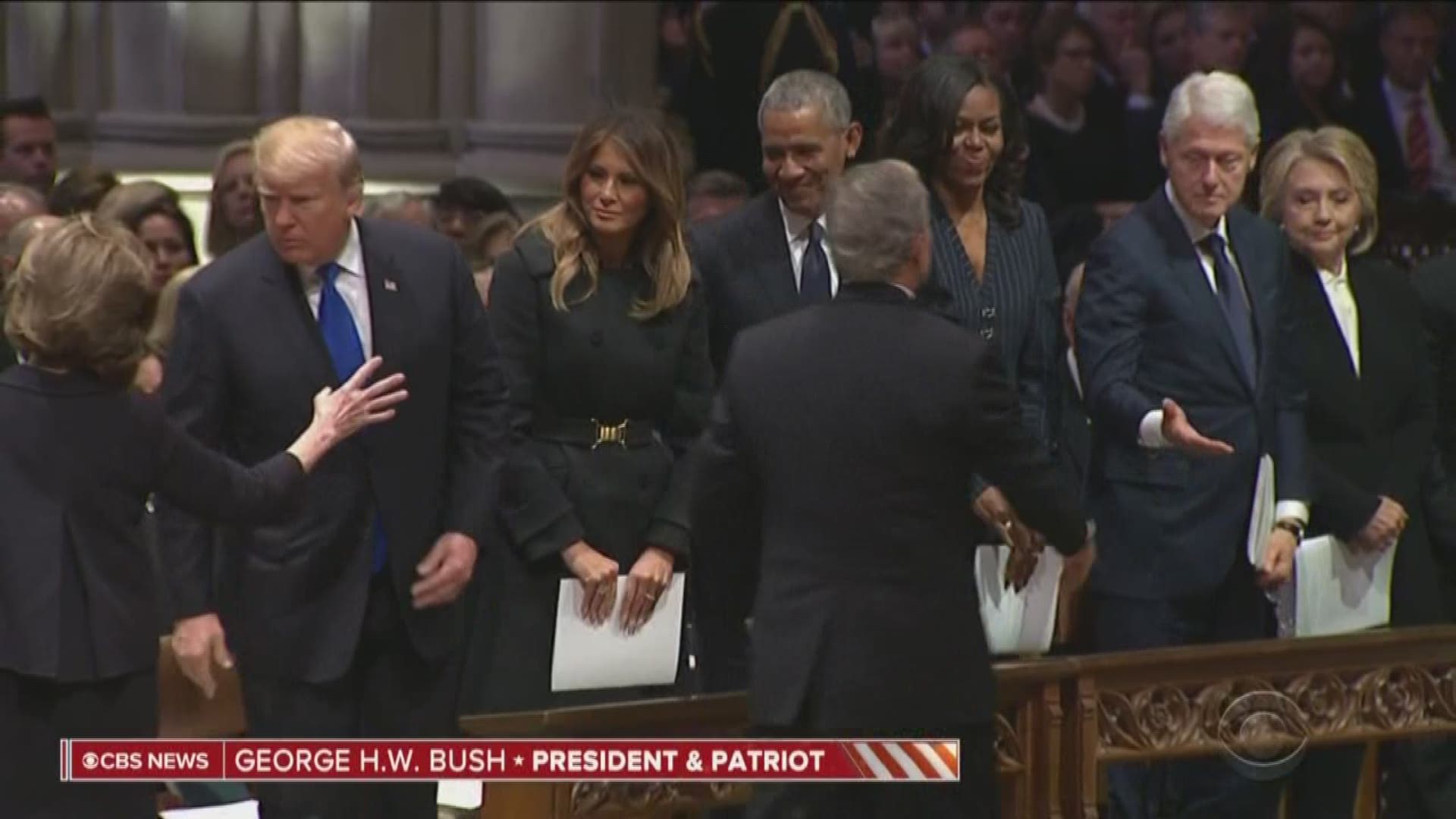 President George W. Bush appears to have given Michelle more candy! The cute moment happened at the start of President George H.W. Bush's funeral.