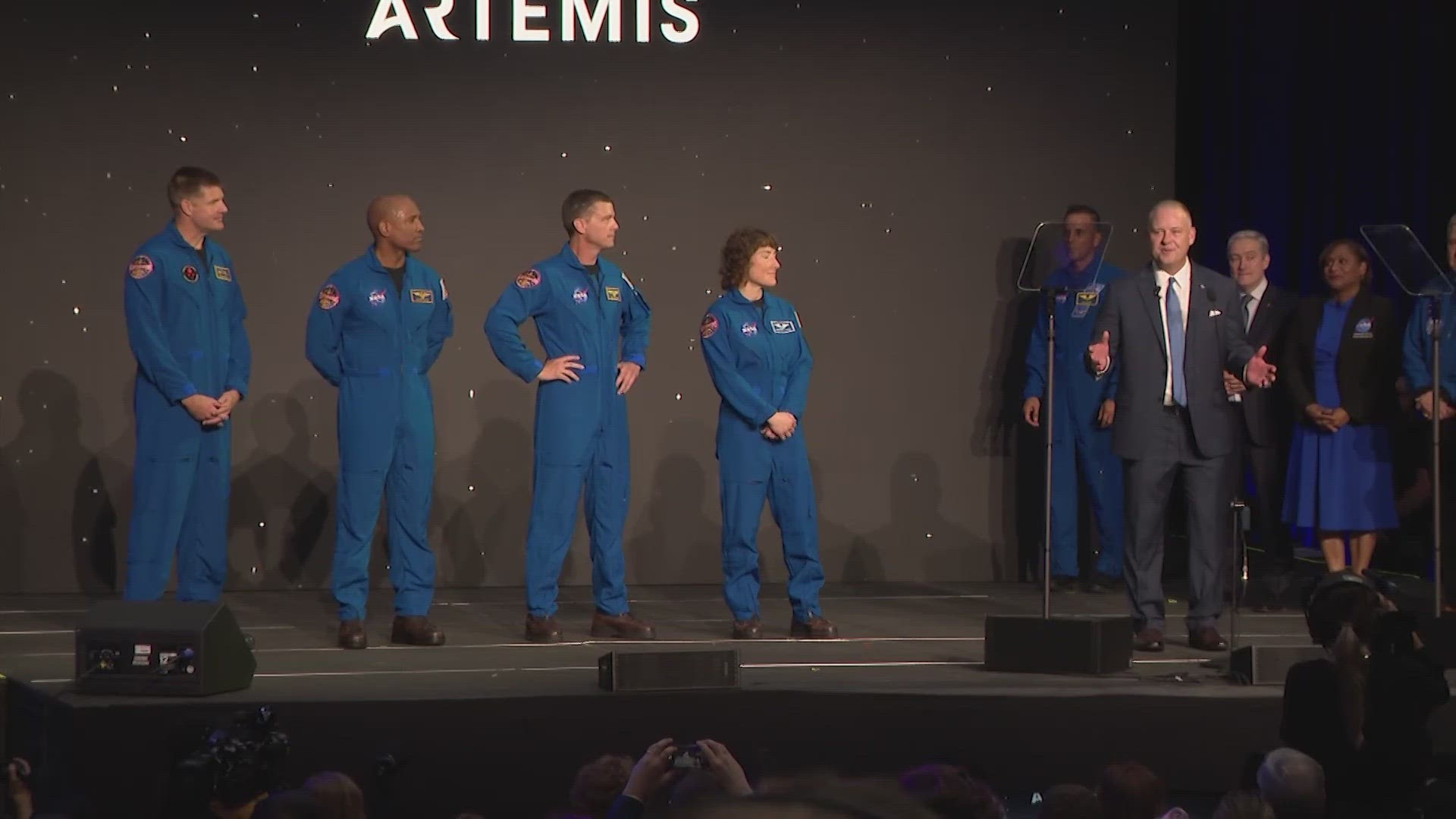 The three Americans and one Canadian were introduced during a ceremony in Houston, home to the nation's astronauts as well as Mission Control.