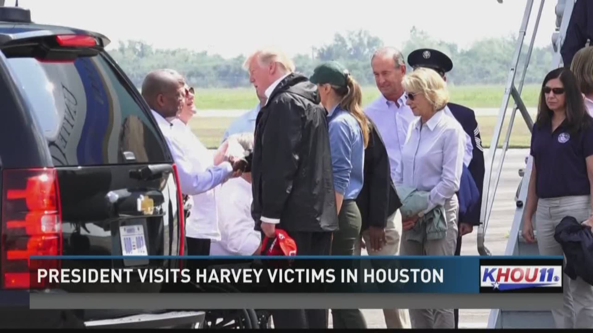 President Donald Trump visited Harvey victims in Houston Saturday.