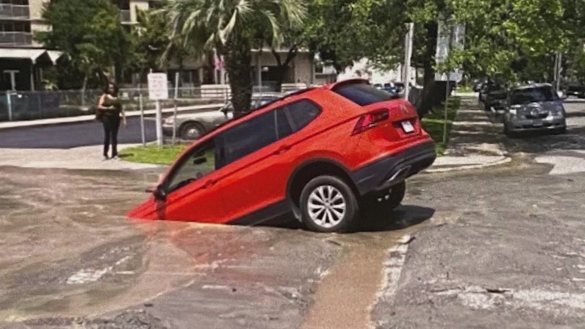 John King was doing his routine run to the market when the front end of his SUV was suddenly devoured by what he thought was a shallow puddle.