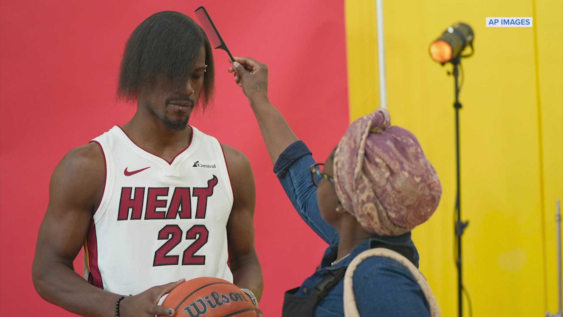 Tomball's own Jimmy Butler showed up to Miami Heat media day sporting a new look - straightened hair with a side part.