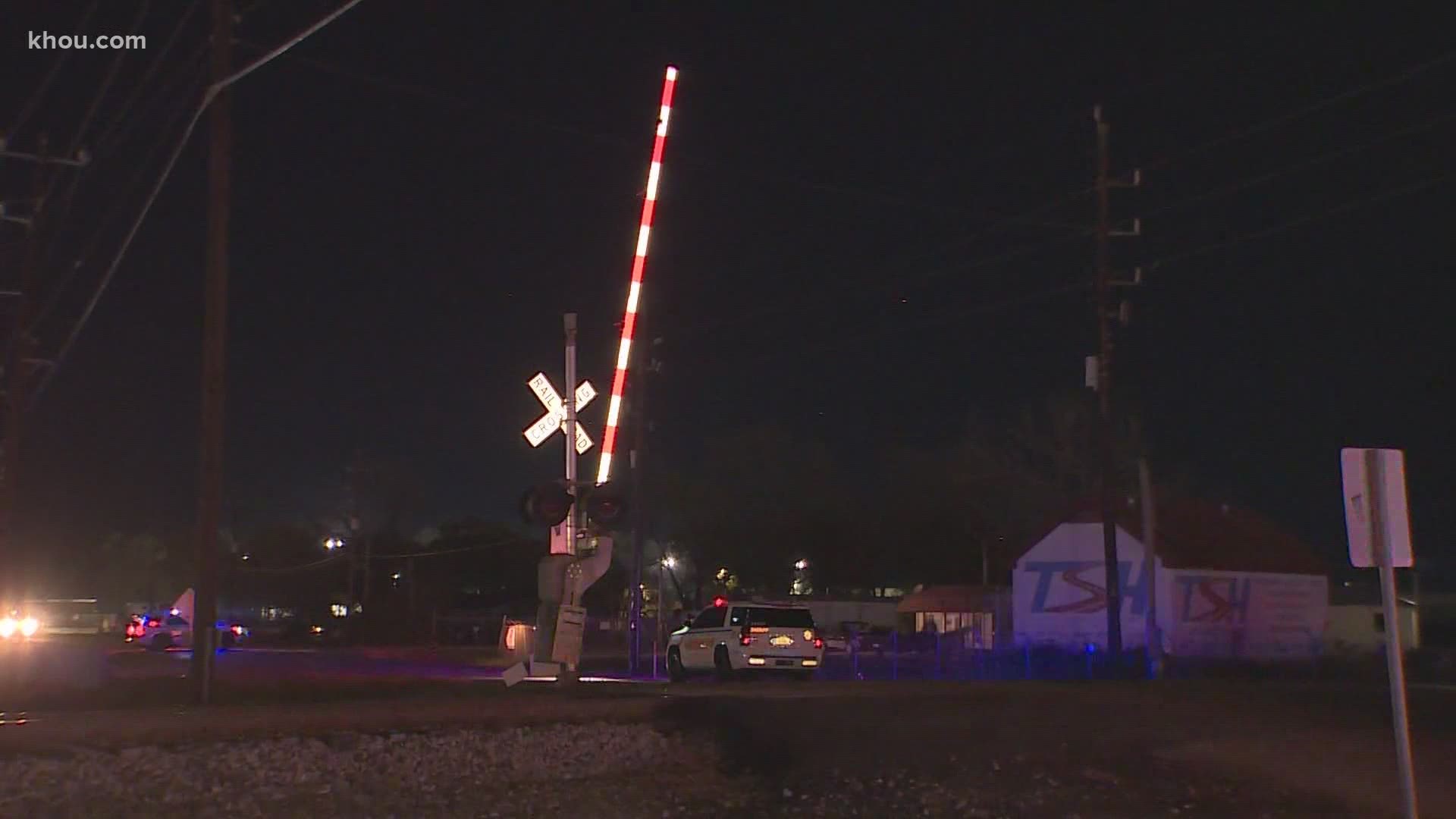 Sheriff Ed Gonzalez said the SUV went around two vehicles and through the railroad crossing arms in an attempt to get across the tracks before the train passed.