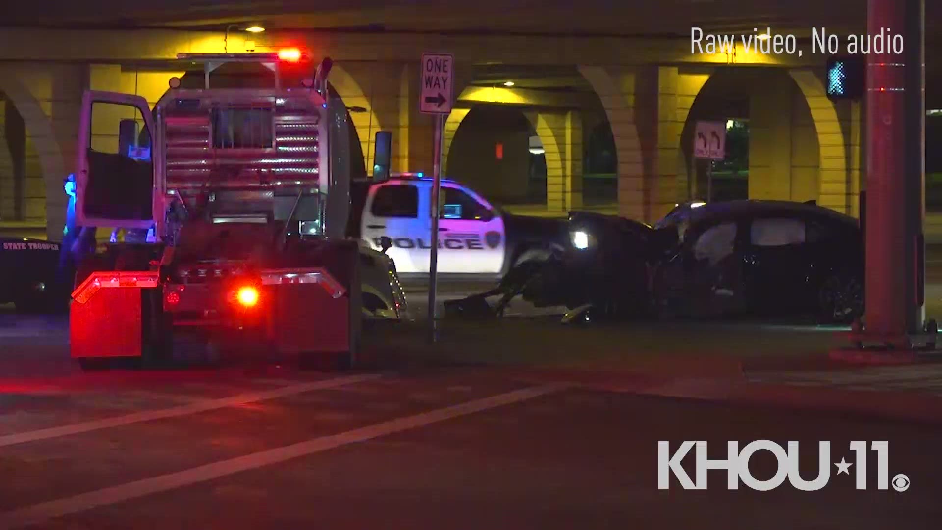 A deadly crash between a Lexus sedan and a large truck was under investigation early Friday morning on west Houston.