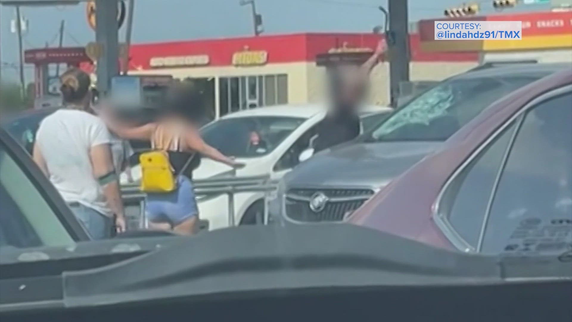 Baby being rescued from a car after the parents accidentally locked th