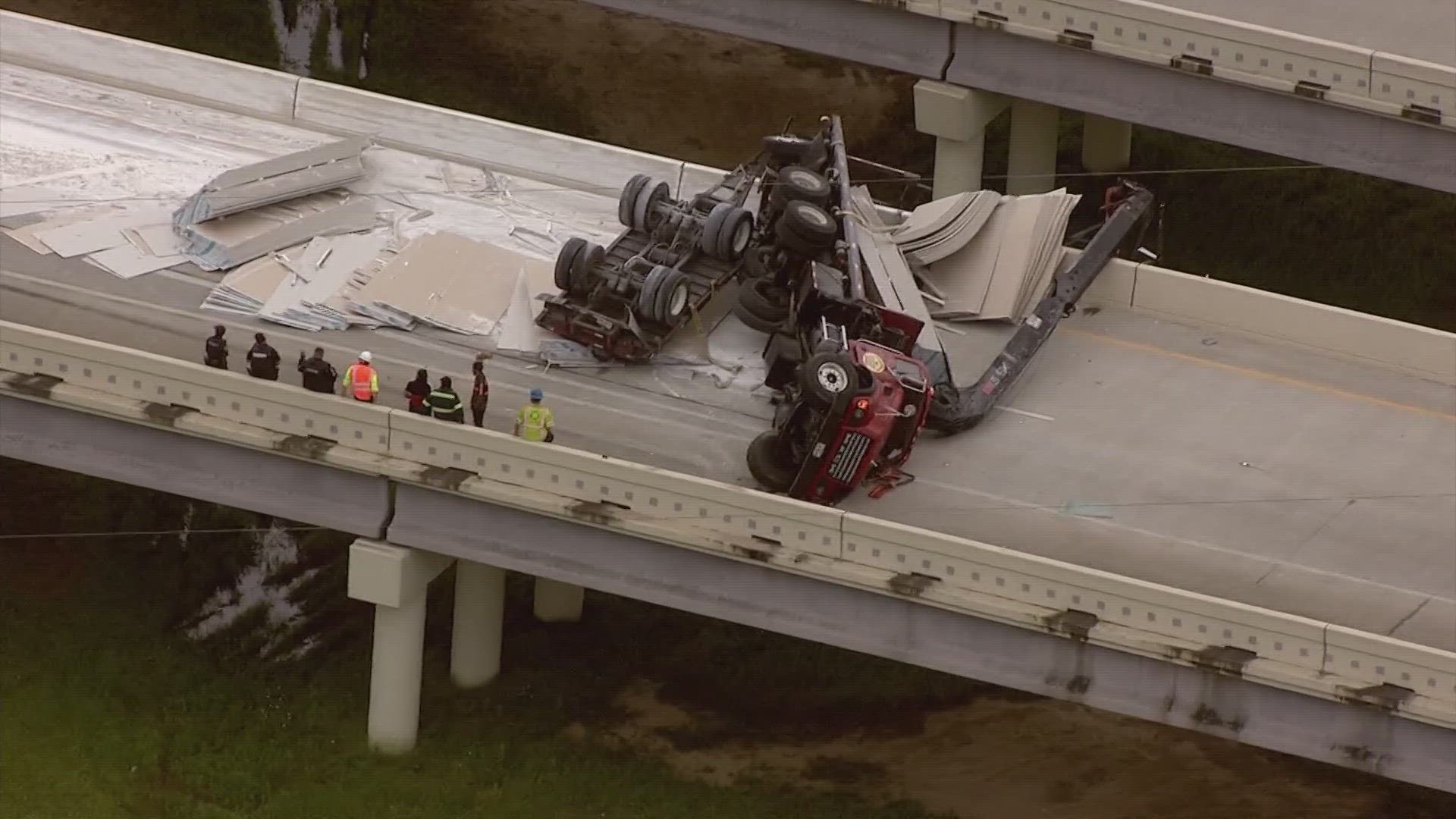 The driver of the overturned 18-wheeler was taken to an area hospital to be treated for injuries.
