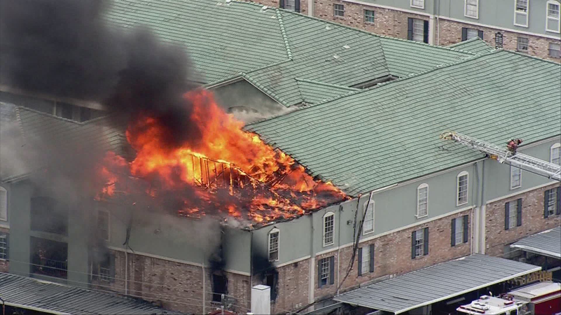 Firefighters battled a three-alarm apartment fire in west Houston Friday afternoon.