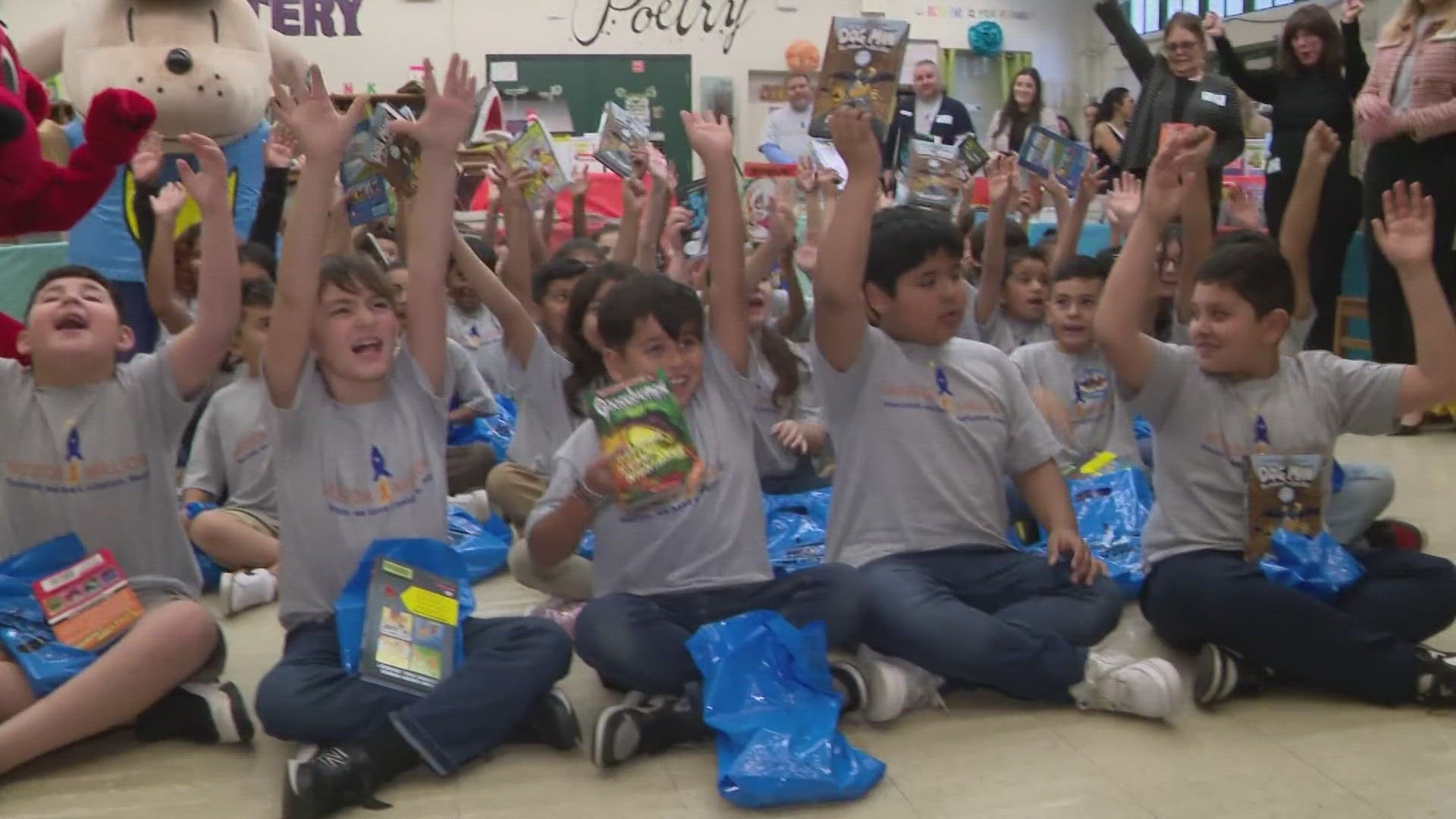 In honor of the milestone, the 400 students at Robert Browning Elementary received six free books of their choice.