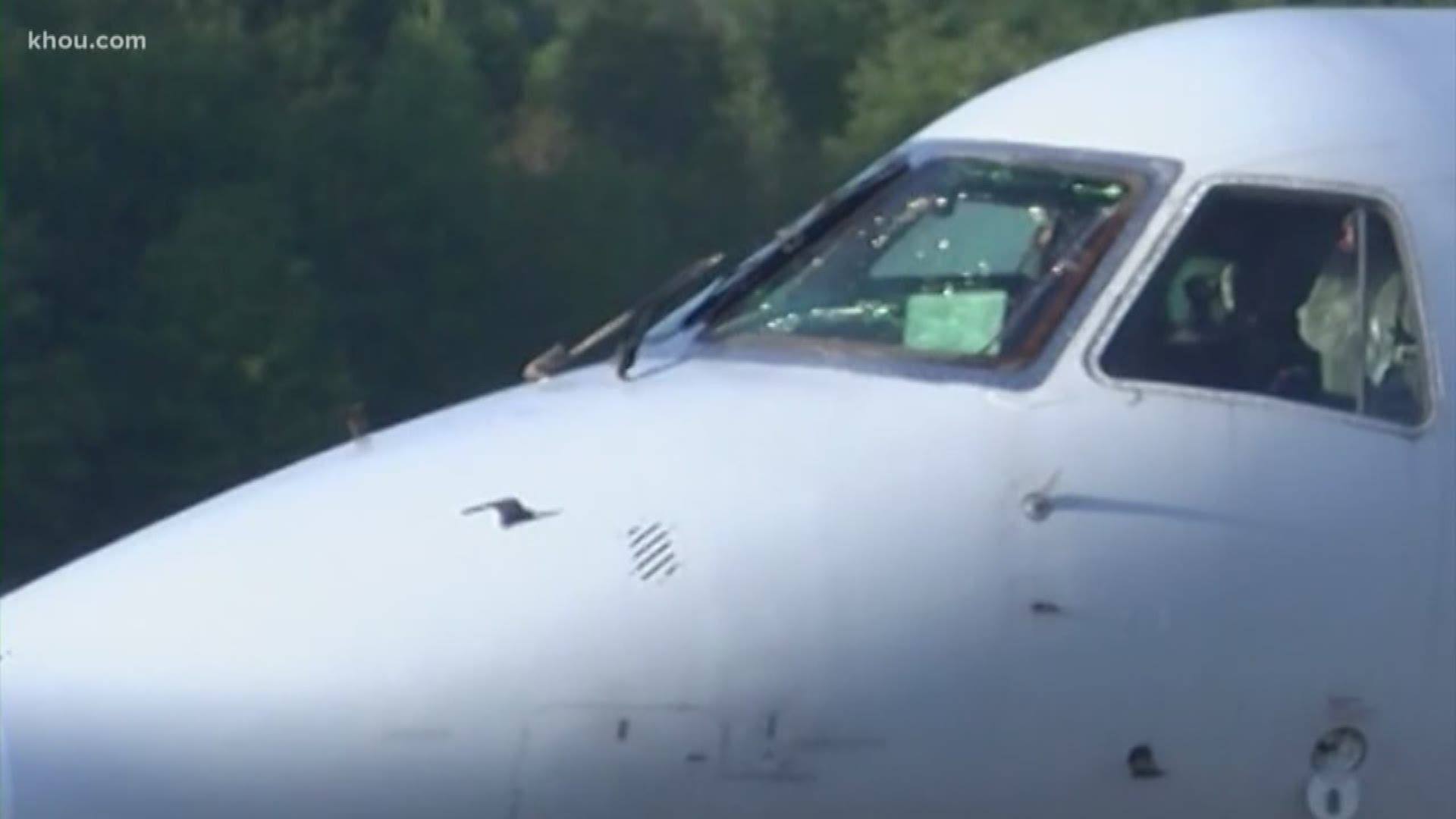The windshield of a plane, chartered to fly workers to the Texas oil fields near Midland, shattered mid-flight Tuesday, a spokesperson for the Baton Rouge Airport confirmed.