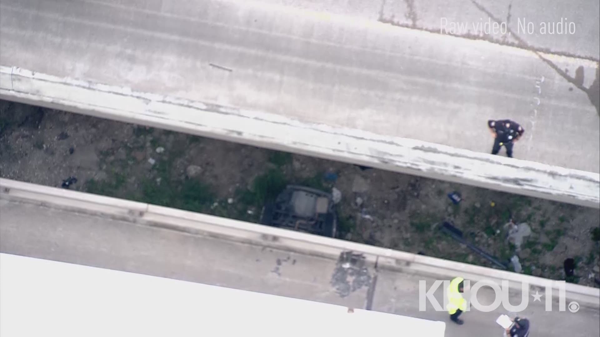 Video from Air 11 shows a car that fell off the bridge landed upside down on the embankment below. The sheriff's office says a child died in the incident. https://www.khou.com/article/traffic/hcso-4-year-old-dies-after-car-falls-off-i-10-bridge/285-1e4dec64-8daa-4c7a-905f-5b143d43833f