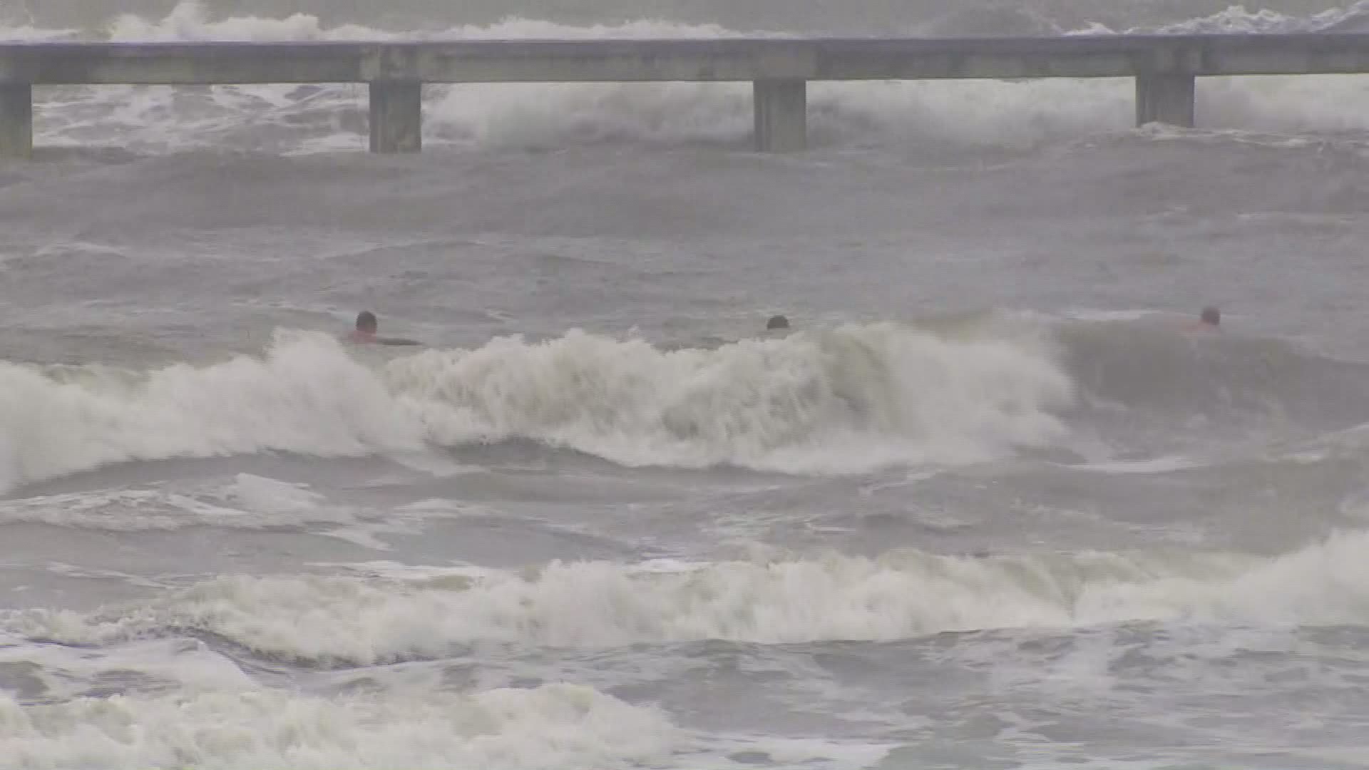 As the outer bands of Tropical Storm Imelda lash Galveston Island and the Gulf Coast of Texas, surfers brave the choppy waves. The latest models show some spots could see 12 to 24 inches of rain.
