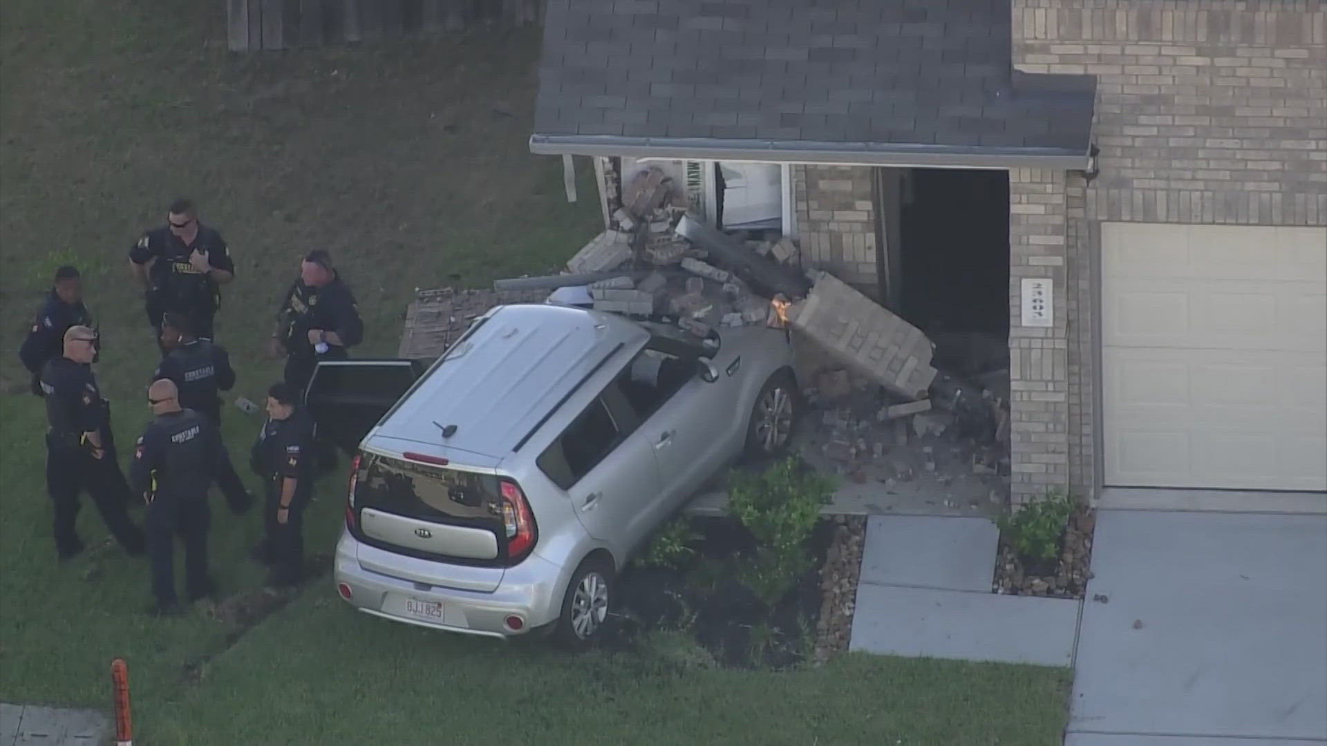 Harris County Precinct 4 Constable Mark Herman's Office said the suspects were arrested after crashing into a house on Purple Wisteria Lane.