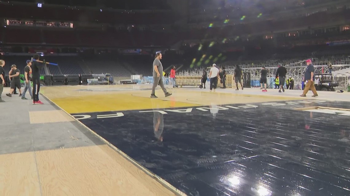 Crews install court for Final Four at NRG Stadium