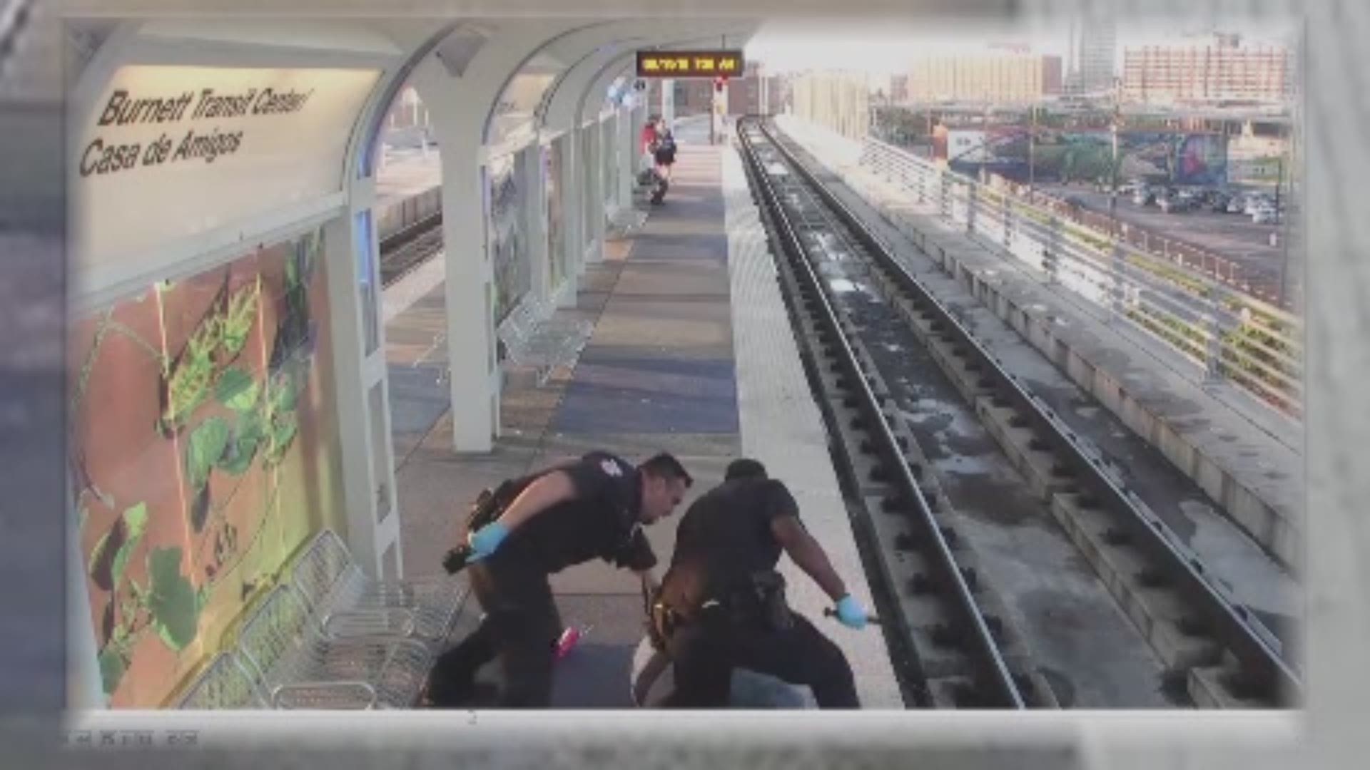 Metro police released disturbing video of two officers apparently beating a man who had been sleeping on a light rail train platform.