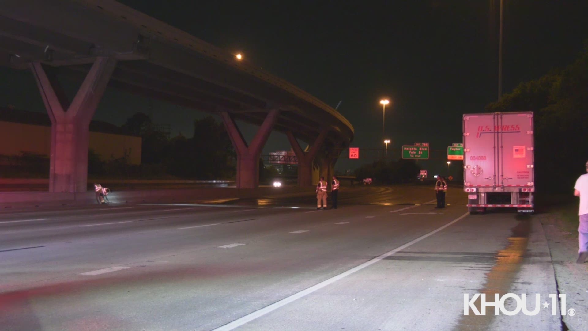 The westbound lanes of the Katy Freeway are closed near downtown as crews work to clean up a full spill on the roadway.