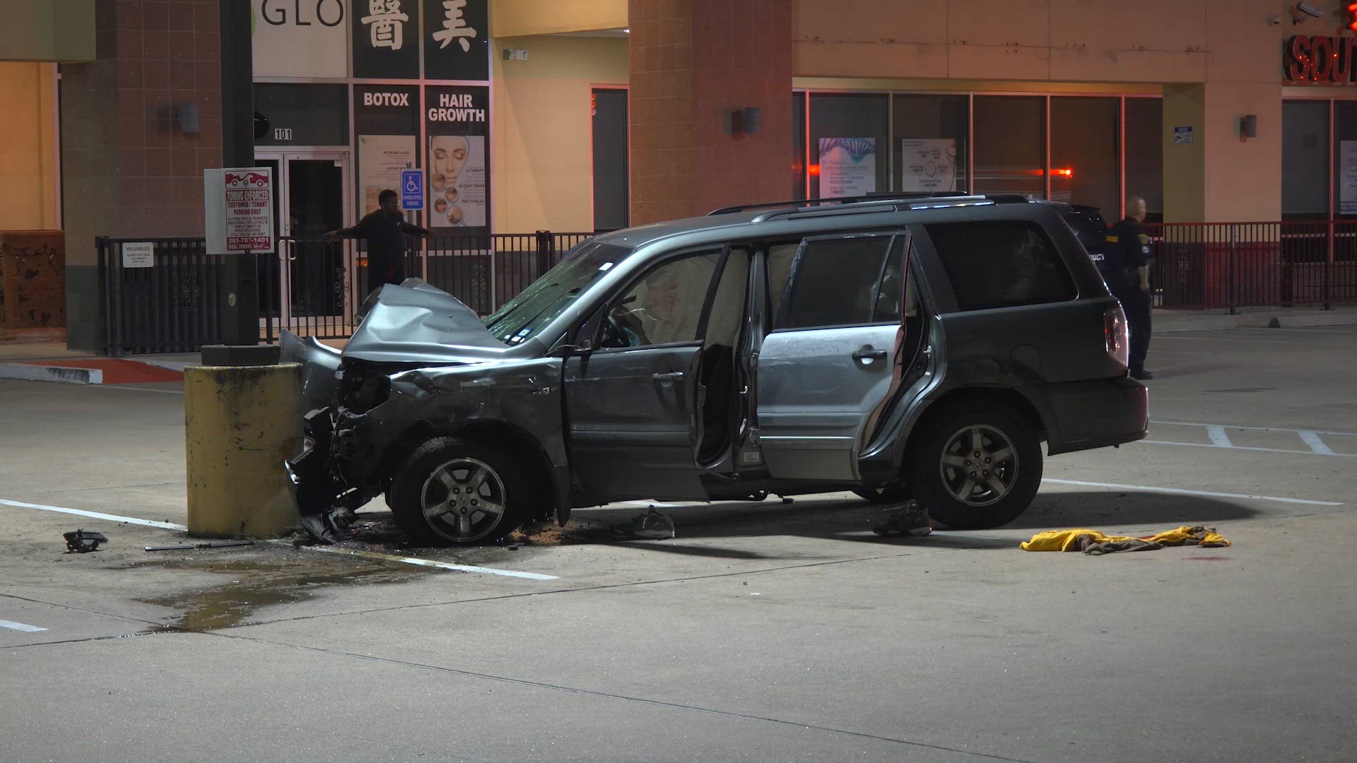 Victim found with gunshot wound to neck after crashing into pole in ...