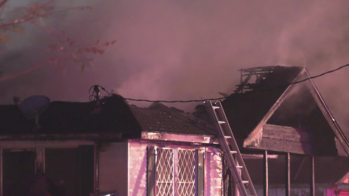 Man fighting for his life after being pulled from house fire in NW ...
