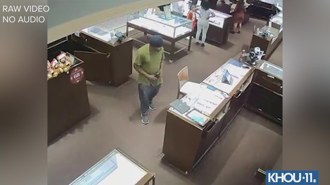 Raw video: Man caught on camera stealing $3,000 from jewelry store ...