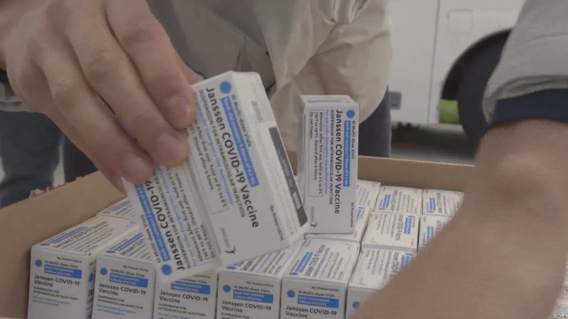 Health officials paused vaccinations after 11 people reported symptoms of nausea and dizziness.