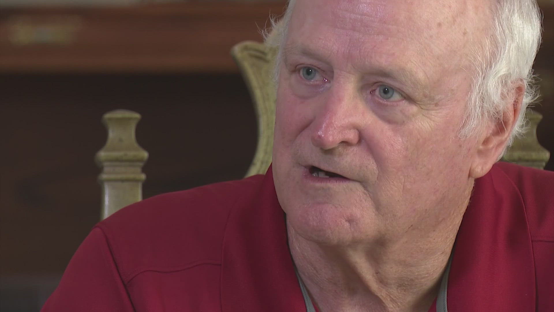 Robbie Allen, 73, says he was knocked unconscious by a carjacking suspect after trying to intervene outside the Houston airport.
