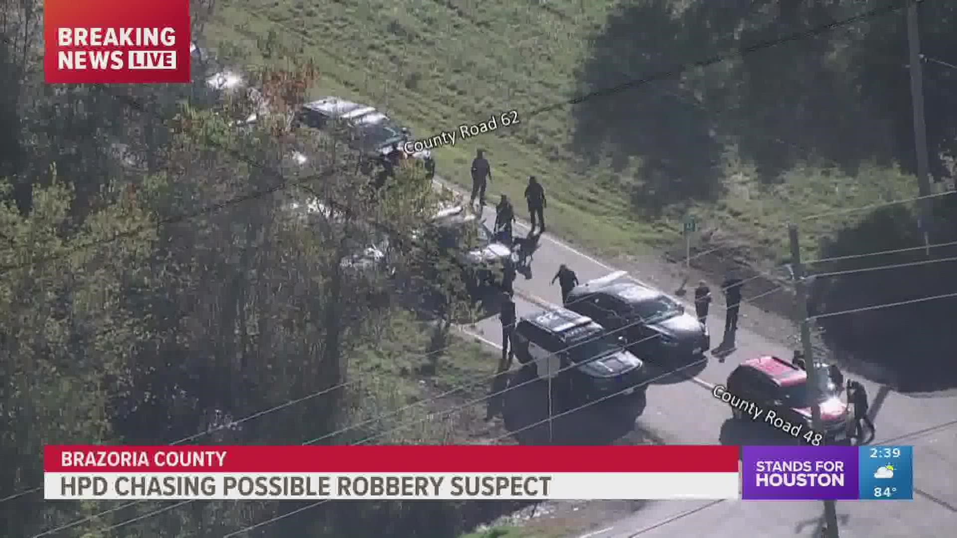 Houston police were chasing a possible robbery suspect.  One person was detained.