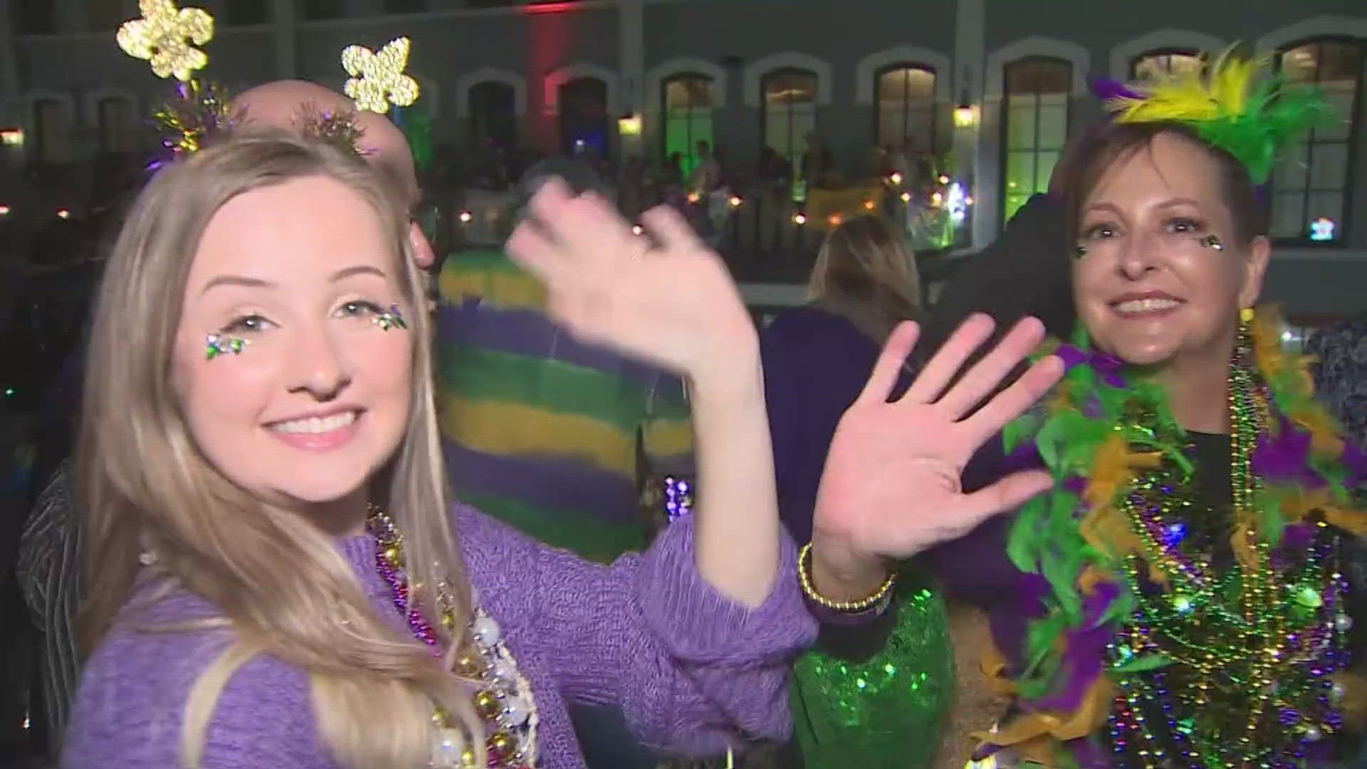 The Strand is lined with many people enjoying the food, fun and parades in the 113th year of Mardi Gras.