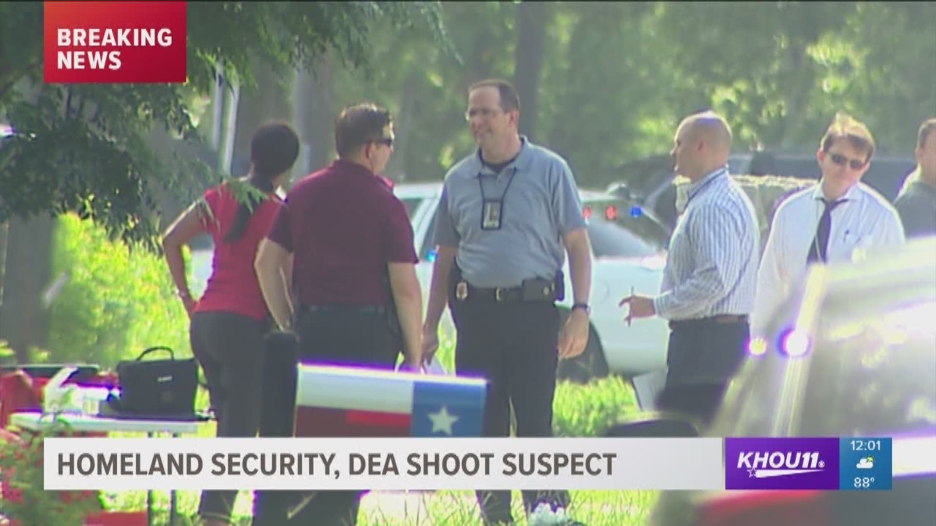 A suspect was shot by a Homeland Security agent while they were serving warrants at several homes in southwest Houston early Wednesday.