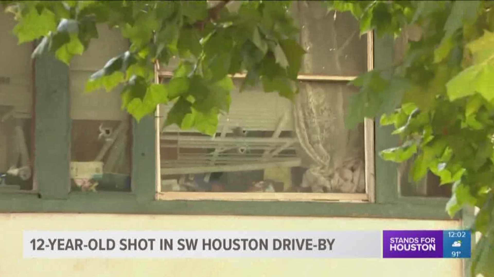 A 12-year-old girl was grazed by a stray bullet during a drive-by shooting in southwest Houston overnight.