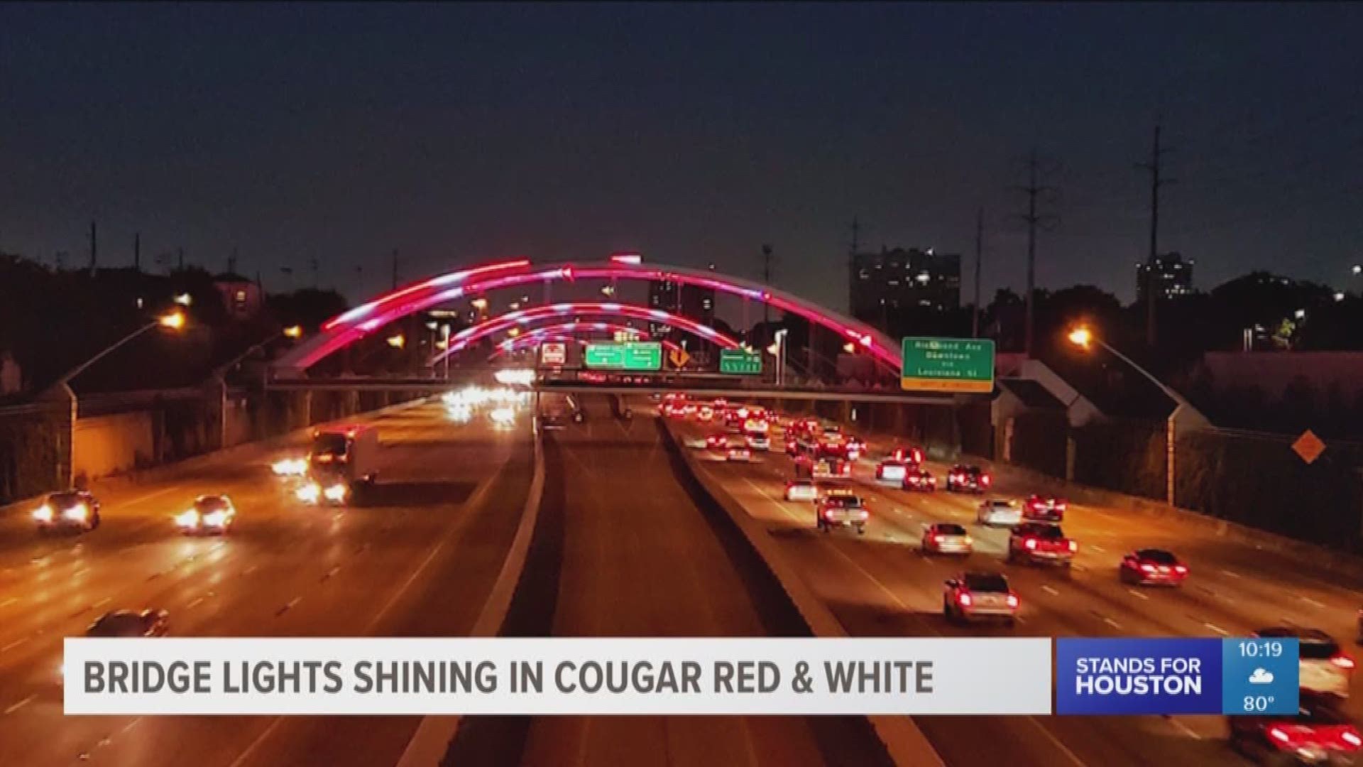The bridges over Highway 59 shined in red and white before Houston's game against Arizona Saturday.