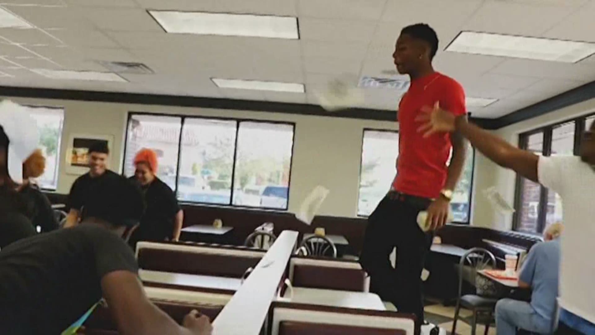 A Houston rapper is quickly making a quite the name for himself with viral videos show him throwing out cash to unsuspecting guests at Whataburger.