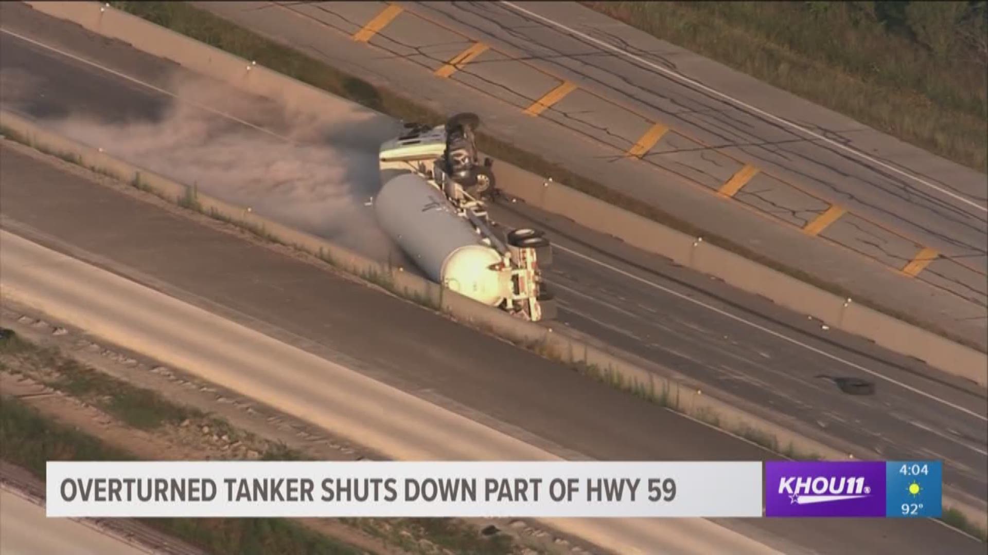 After a tanker overturned, spilling a flammable gas on US 59 early Wednesday morning, the interstate was shut down for most of the day.