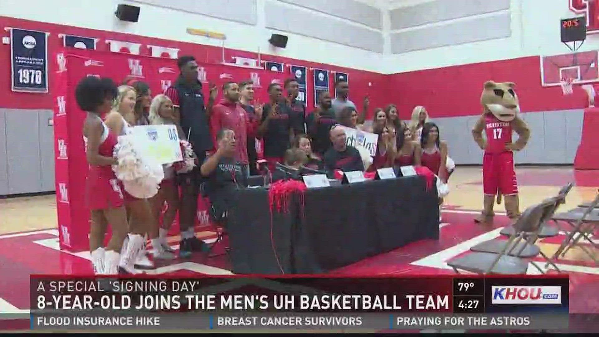 Eight-year-old Nicholas Hickey had a special signing day with the UH men's basketball team.