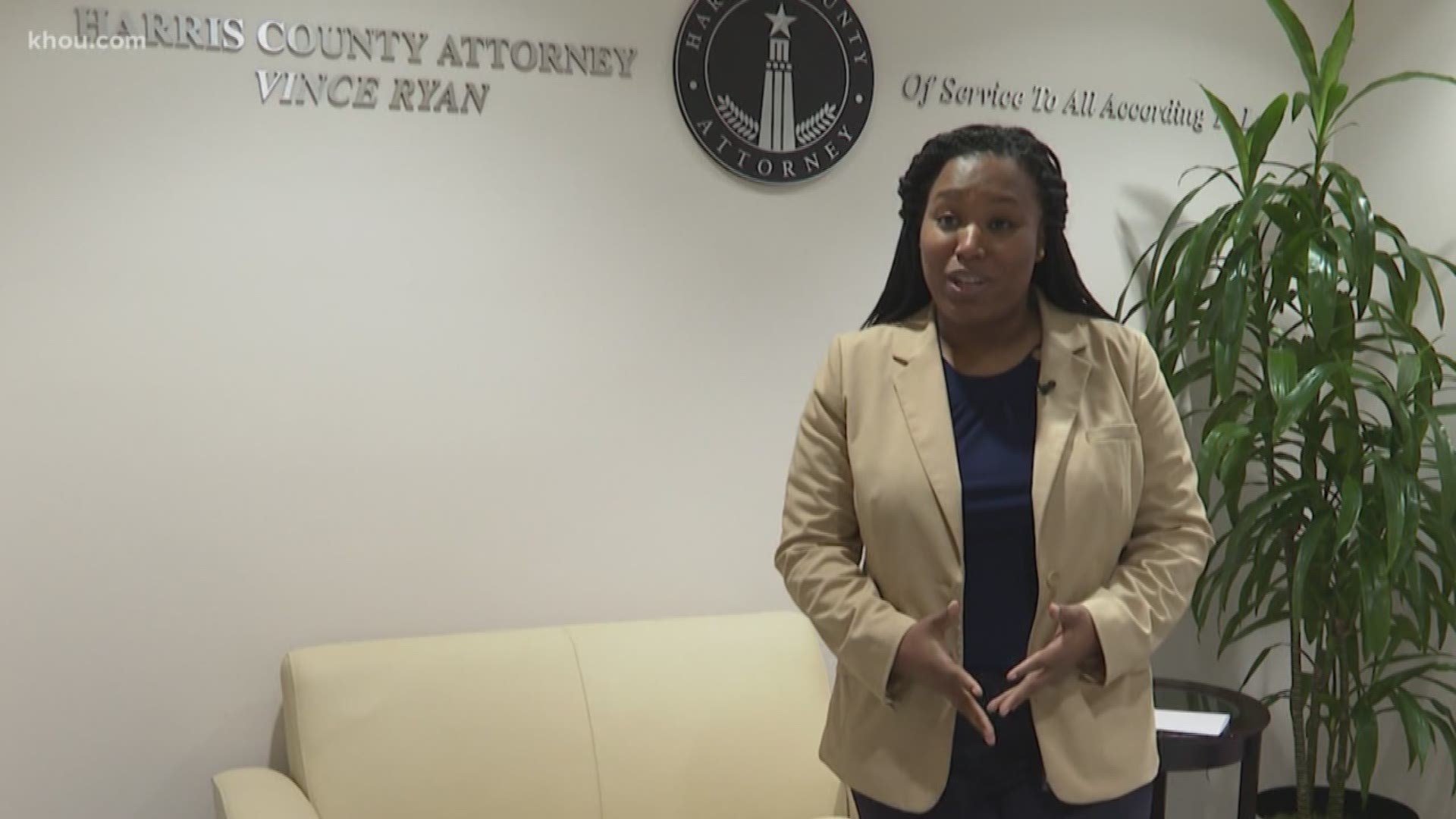 A mother of five whose graduation pictures with her kids went viral is now working as a Harris County attorney.