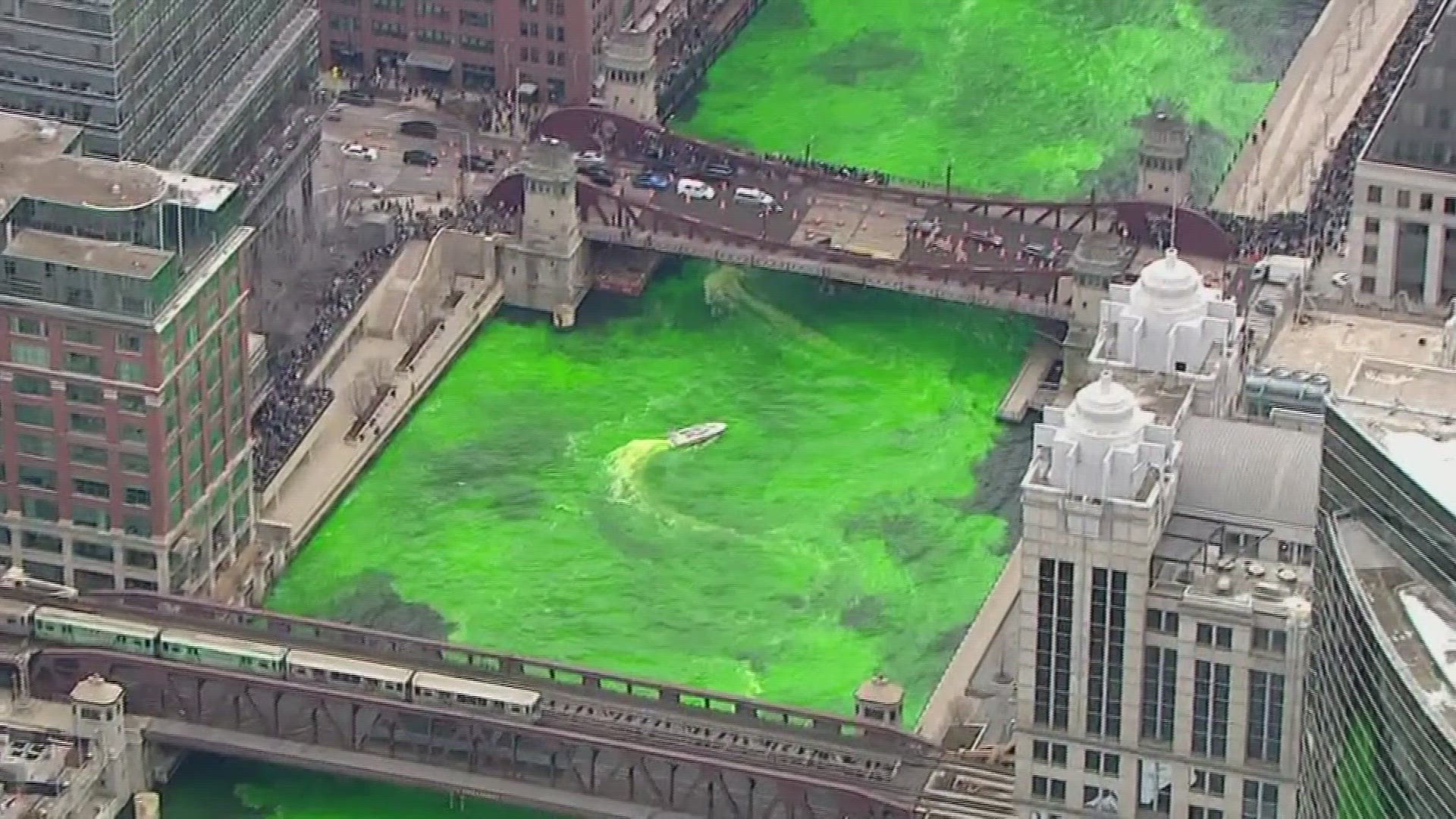 Watch as boats add dye to turn the Chicago River green for St. Patrick's Day!