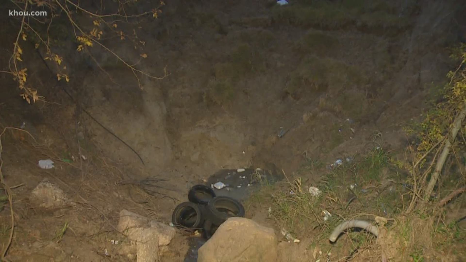 A giant sinkhole has opened up in east Houston and it's threatening a family's home.