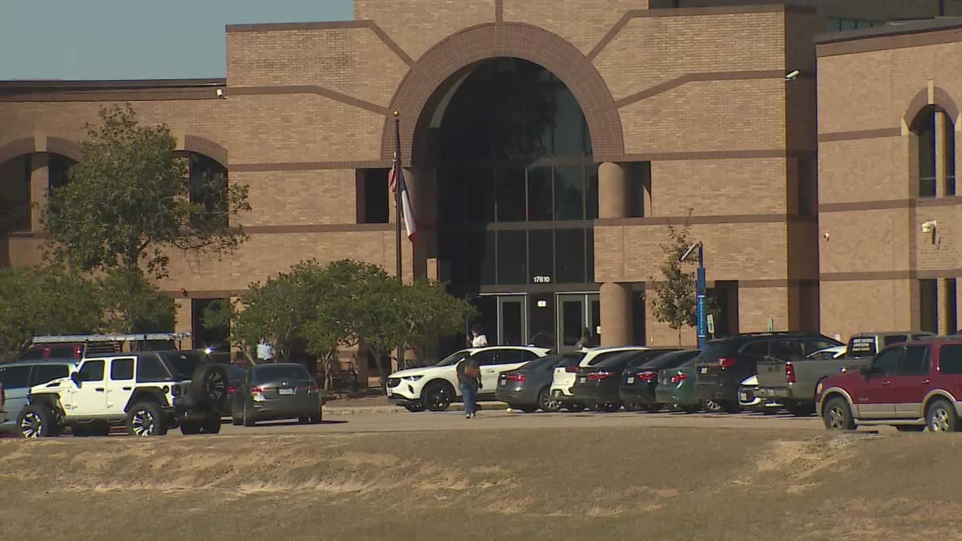The incident was caught on camera outside Langham Creek High School where social media threats also arose.