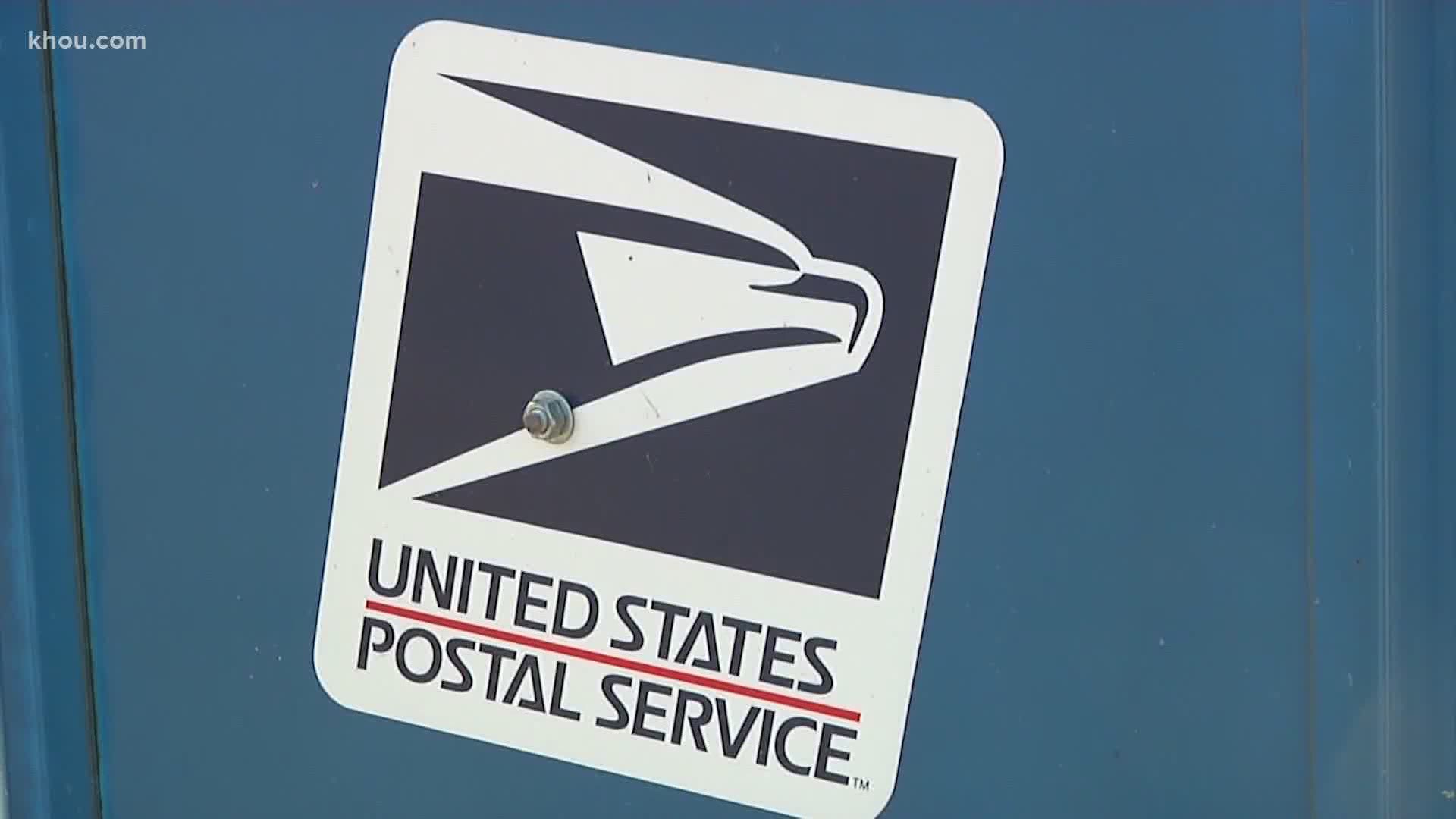 The postmaster general said he would “suspend” his initiatives until after the election “to avoid even the appearance of impact on election mail.”