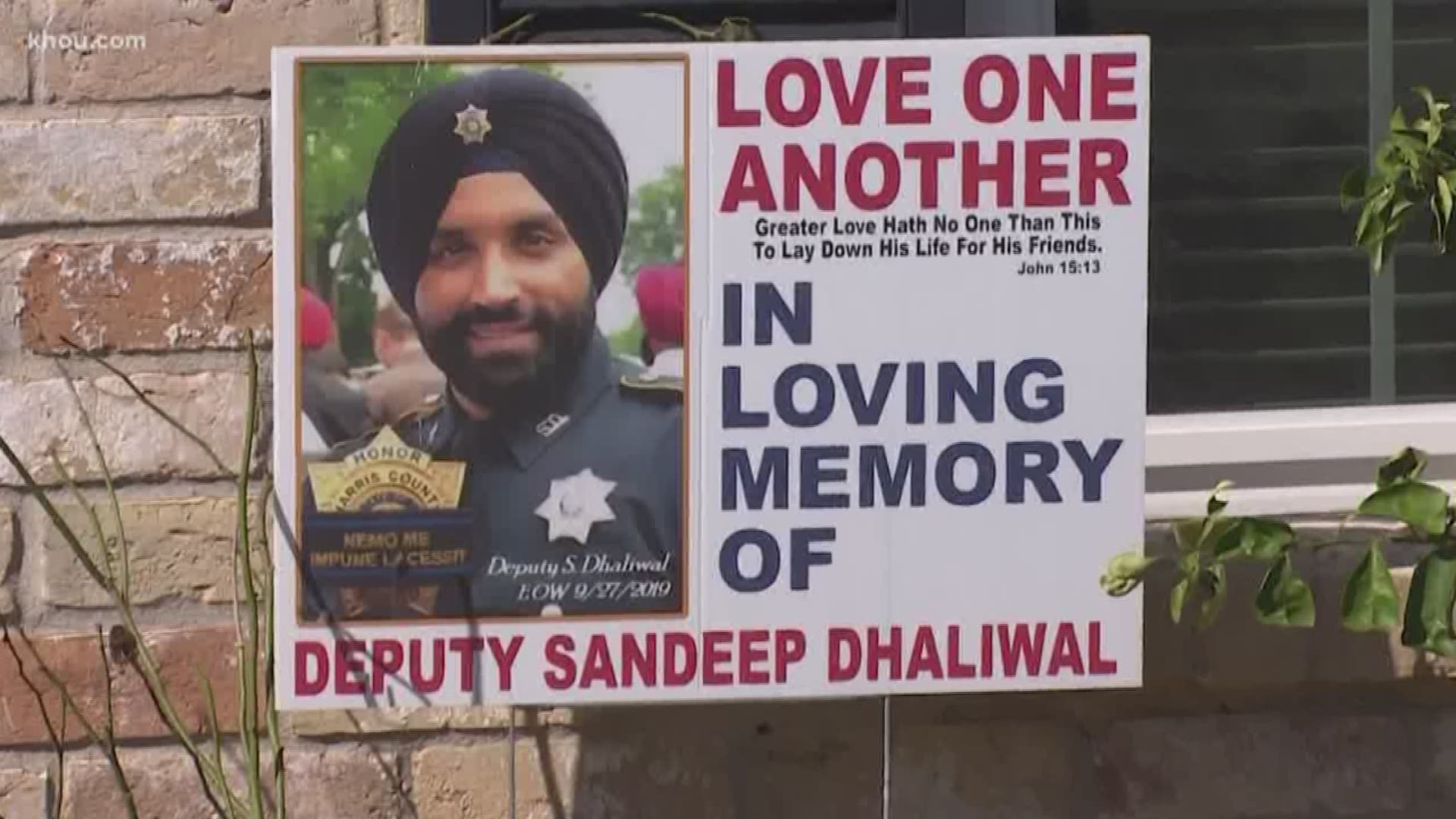 A woman in Spring says she just wanted to honor slain deputy Sandeep Dhaliwal with a yard sign, but her HOA initially told her to take it down.